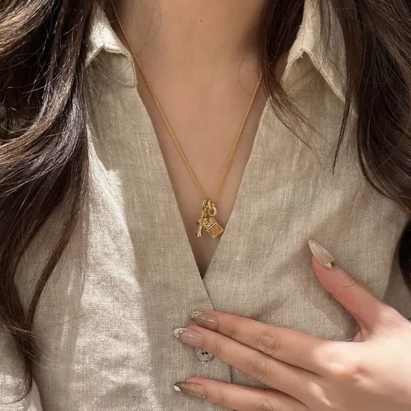 Chrome Hearts Gold Tone Dice and Cross Charm Necklace